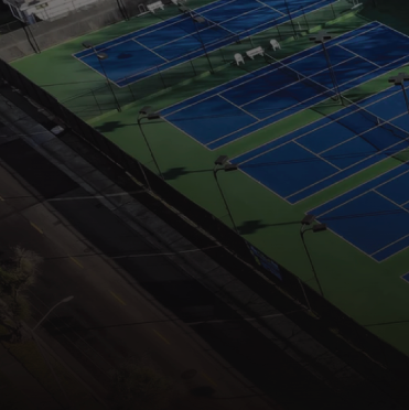 Aerial view of Del Norte Athletic Club's tennis courts and pool facilities